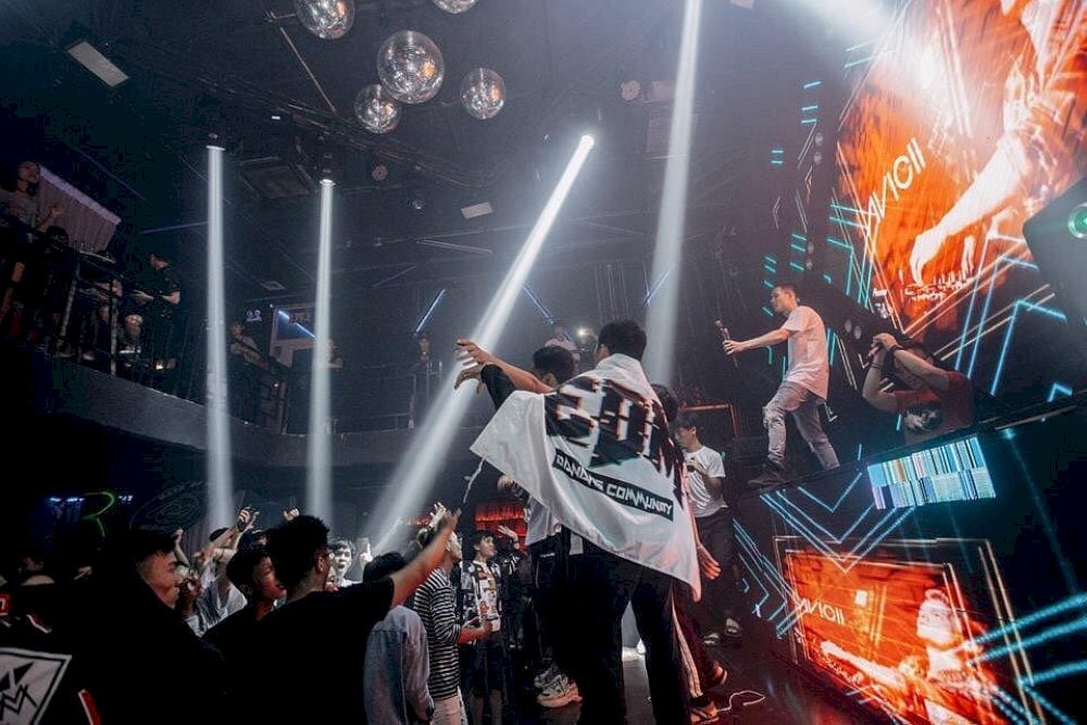 Step into a world of neon lights, booming bass